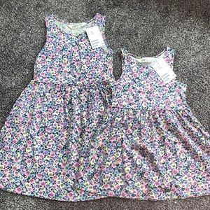 Matching floral dresses! 🌼🌺🌸